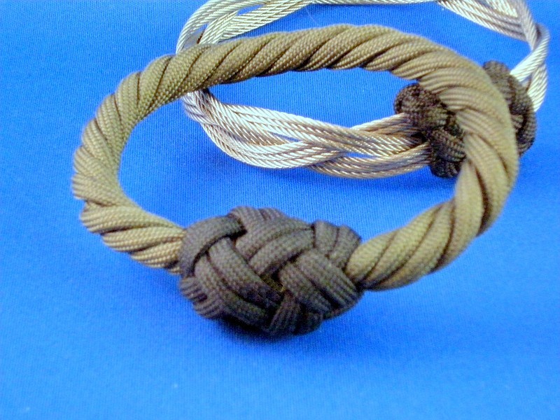 A Bangle Bracelet Made From A Paracord Grommet And A Turk's Head Knot