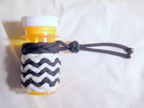 Medicine Bottle #38; A Spanish Ring knot and A Bi-color Pineapple Knot Make A Handsome Bottle.