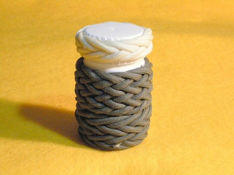 Medicine Bottle #42; with three Gaucho knots covering all of it.